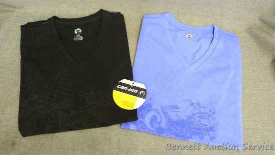2 NIP Ladies Bombardier Recreational Products V-neck T-shirts are sizes S/P and M/M and were donated