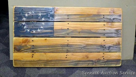 Handmade wooden American flag is 21" x 38" and was donated by De-Mon Racing.