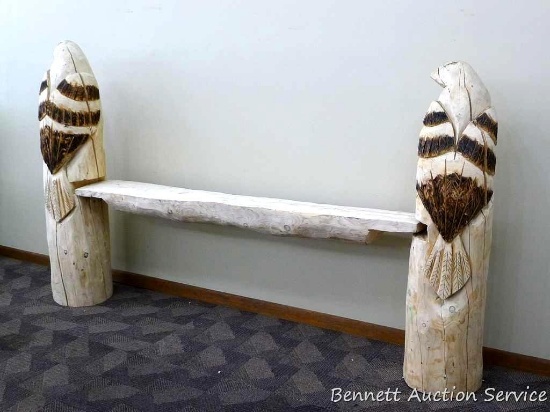 Chainsaw carved eagle shelf is 51" tall x 88" long x 11" deep and is donated by Andrea & Kevin