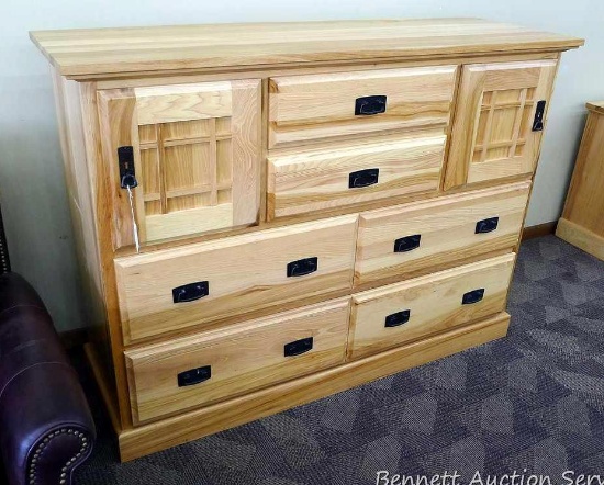A America solid hickory dresser with metal drawer slides is 60" x 20" x 43-1/2" tall and appears in