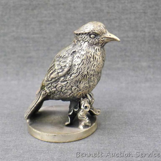 Solid cast metal bird figure stands 3" tall. No markings found. Really cool piece.