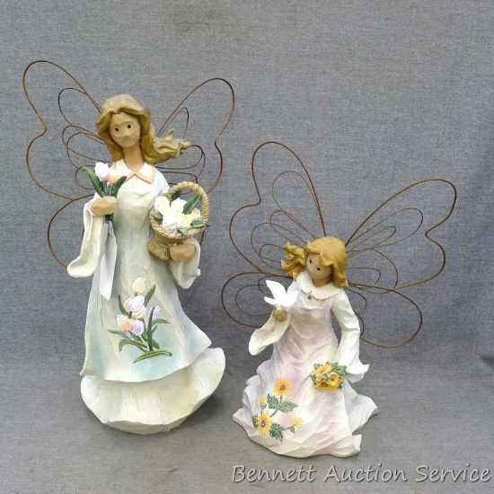 Pair of garden angel figurines are both in good condition. Tallest is approx. 16" to top of wing.