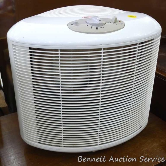 Sunbeam air purifier with ionizer is 17" x 14" x 16", turns on.