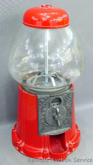 Carousel Industries metal gum ball machine is approx 8" dia x 15" tall with a glass globe