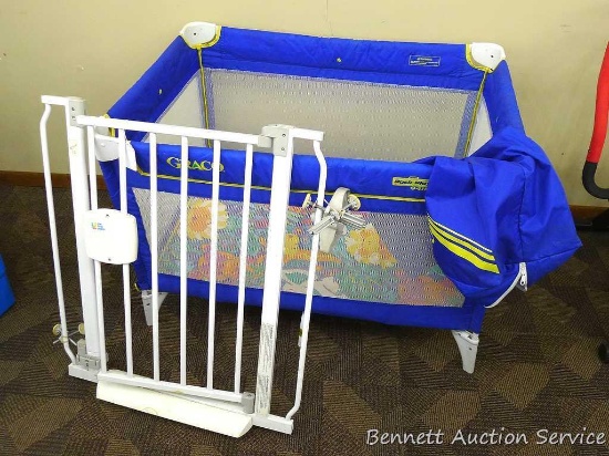 Graco portable play pen with nylon bag; measures 48" x 28-1/2" x 29" tall; The First Years aluminum