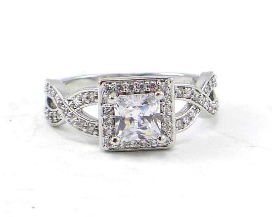 Seller's note states "White sapphire crystal 10kt white gold filled ring, size 10".