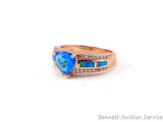 Seller's note states "Aquamarine blue fire opal heart ring rose gold, size 8".