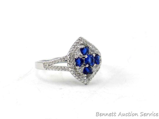 Seller's note states "Sterling silver white and blue sapphire ring, size 7".
