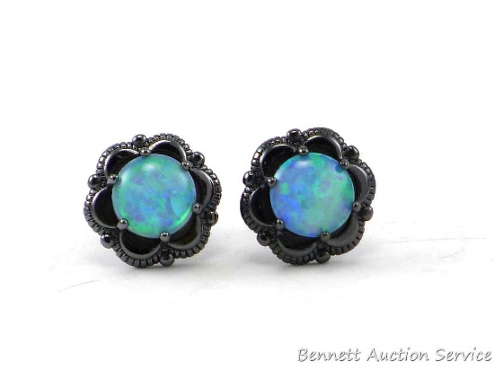 Seller's note states "Vintage round blue fire opal stud earrings".