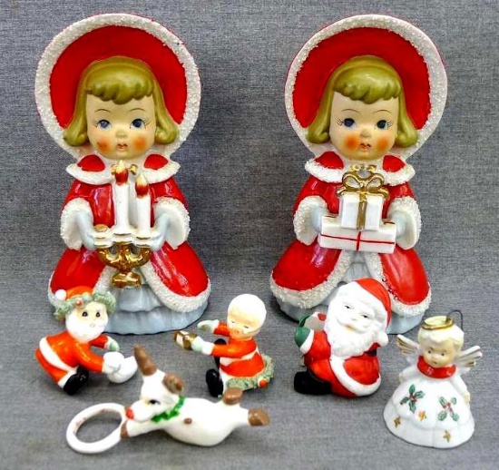 Christmas figurines include two girls that are 6-1/2" tall, marked Japan, one candle is broken off;