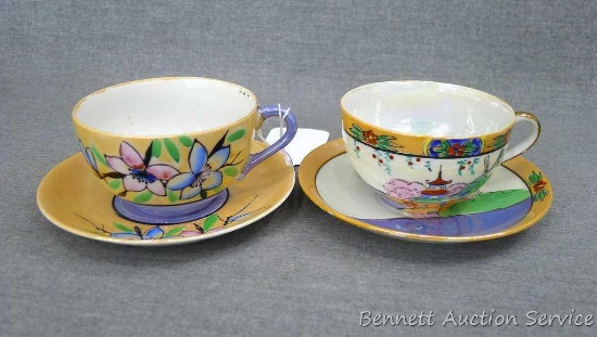 Cup and saucer hand painted in Japan, saucer measures 5-1/2" diameter, cup is 3-1/2" diameter by 2"