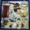 1976 flag pins, Warsteiner bottle opener, religious medallions and more.