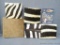 Four photo albums with Zebra skin covers and one other album. Largest is 9-1/2