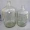 Two glass bottles for making wine. Includes a 3 gallon and 5 gallon. Appear new.