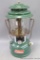 Coleman lantern appears to be in good shape. Model No 220H; stands 13