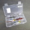 4 fishing lures in a Flambeau box that measures approx 7