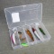 5 fishing lures in a Plano box measuring approx 6-1/2