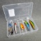 5 fishing lures in a Plano box measuring approx 6-1/2