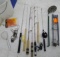Assortment of ice fishing poles, a Polar tip up, metal ice scoop, and more.