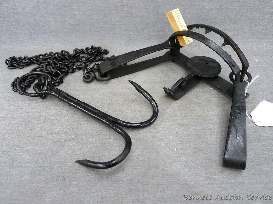 Newhouse No. 48 double long spring trap with good teeth, a drag and a drilled pan.