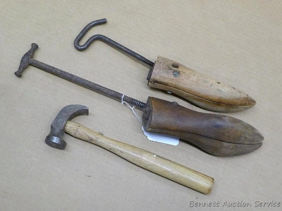 Cobbler's hammer and two shoe stretchers. Longest stretcher is 18".