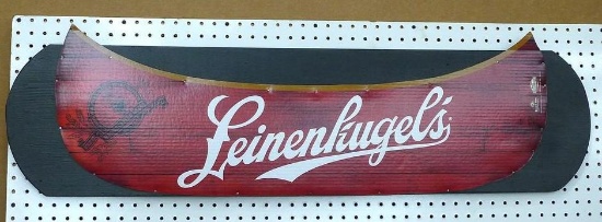 Cardboard Leinenkugel's sign mounted on wood. Approx. 11" w x 46" long. In very nice condition.