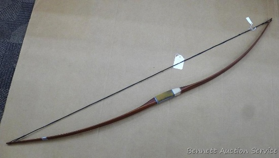 Vintage wooden long bow, 52" long. Charmingly simple.