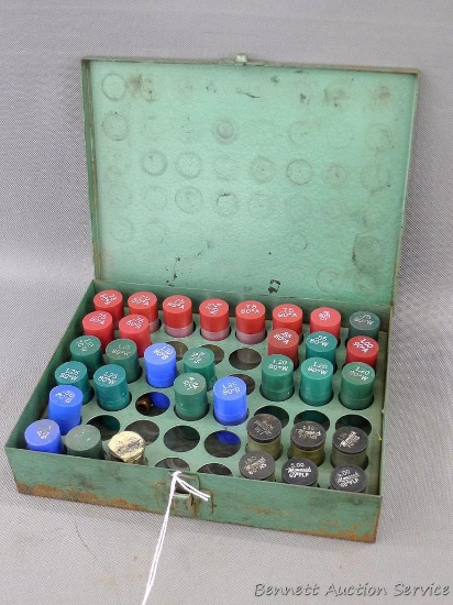Assortment of Monarch orifices of different sizes for fuel oil furnace. Case measures 8-1/2" x