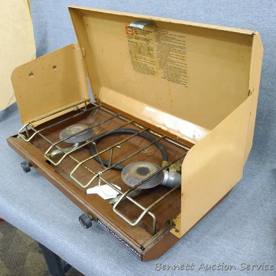 Primus Outdoorsman two burner propane camp stove, model 4500-A. Measures 20" x 12" x 13" high when
