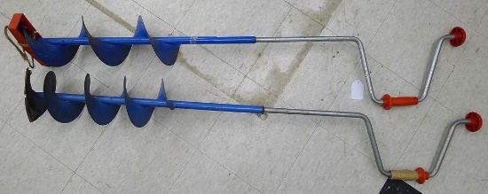 Two Strike Master hand ice augers with 7" blades. One has taped handle.
