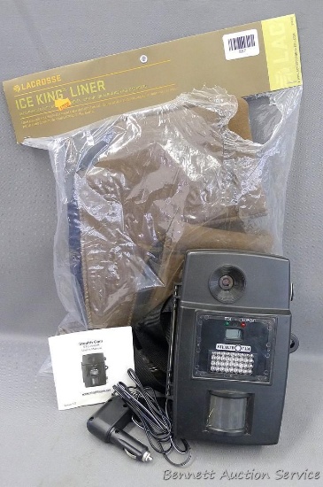 Stealth Cam trail camera and La Crosse Ice King size 9 boot liners.