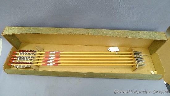 Seller says 9 cedar shaft arrows with Hills Hornet Broadheads in box.