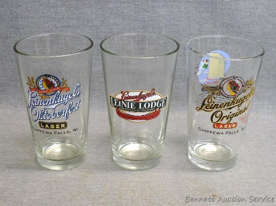 Three Leinenkugel's glasses including Oktoberfest Lager, Leinie Lodge, and Leinenkugel's Original