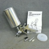 Vaper brand HVLP spray gun with cleaning brush, manual and more.
