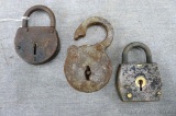 Three old iron padlocks incl. Terror and more.
