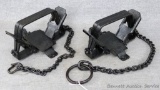 2 Double coil spring traps with unreadable pans, approx 7