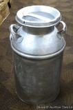 Vintage milk can that has been painted. Approx. 24