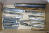 Assortment of metal chisels, punches and more. Longest chisel is 12