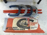 Champ Horseshoe set, official size and weight. Includes 4 shoes and 2 stakes.