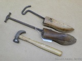 Cobbler's hammer and two shoe stretchers. Longest stretcher is 18