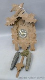 Weight driven German cuckoo clock. Cuckoo works but movement weight drops to floor, seems to not be