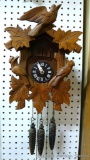 Hand carved German cuckoo clock, pendulum is missing but mechanism runs without it, bird cuckoos on