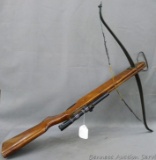 Vintage wooden stock crossbow, with Tasco 4 x 15 scope. Approx. 35