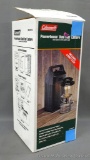 Coleman Powerhouse Dual Fuel Lantern with two mantles and carrying case, Model 295-746, NIB.