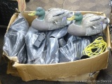 Two Herter's duck decoys with battery operated wings and two boxes of Air Crow Wings.