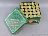 Ducks Unlimited 50th Anniversary tin with Remington all brass 12 shot gun shells, NIB.