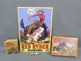 Red Ryder items incl. 1941 book, 1990 camp knife, pocket knife and metal sign. All items are in nice