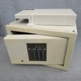 Knox electronic safe, no combination but can be reprogrammed. Been hard wired but can be easily