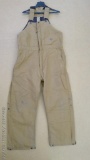 Berne size LR 44-46 bib overalls have slight staining on the knees, otherwise in good condition.