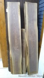 12 pieces of Black Walnut have always been stored inside. Seller states it was cut in Illinois in